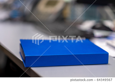 Blue notebook For taking notes Placed on an office Blue notebook For taking notes Placed on an office 64349567