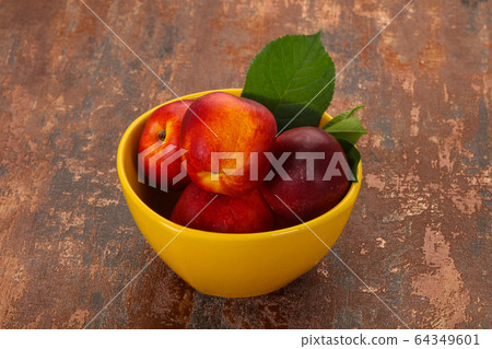 Sweet tasty ripe few nectarines 64349601