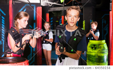 Boy during lasertag game 64350158