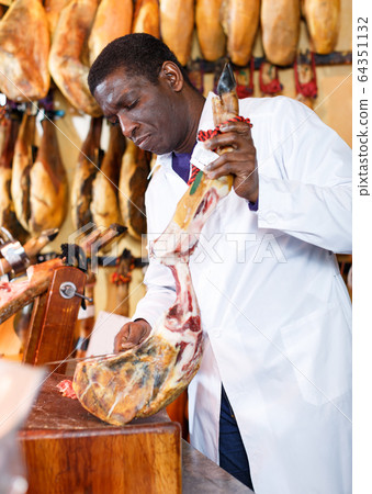 Seller slicing jamon for sale Seller slicing jamon for sale 64351132