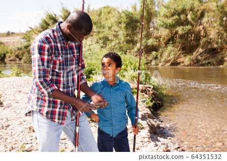 Fisherman and his son 64351532