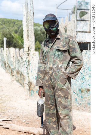 Paintball player after game Paintball player after game 64351546