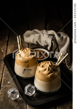 Coffee trend - dalgona coffee, whipped instant coffee 64354140