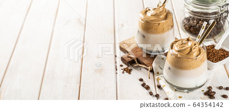 Coffee trend - dalgona coffee, whipped instant coffee 64354142