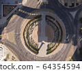 Aerial overhead empty traffic circle 64354594