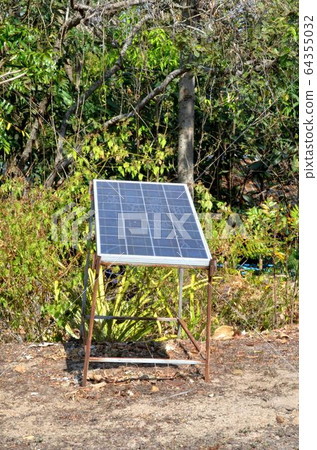 Solar panel in the forest. Solar panel in the forest. 64355032