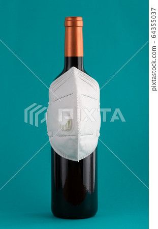 Mask on the bottle as a symbol of protection Mask on the bottle as a symbol of protection 64355037