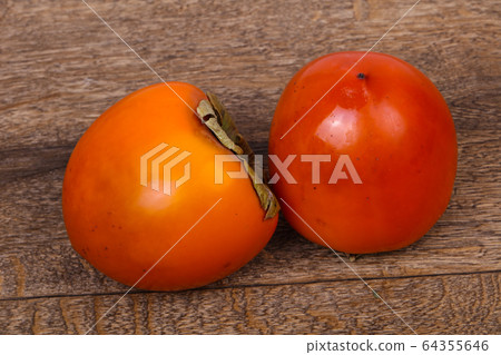Sweet tasty persimmon 64355646