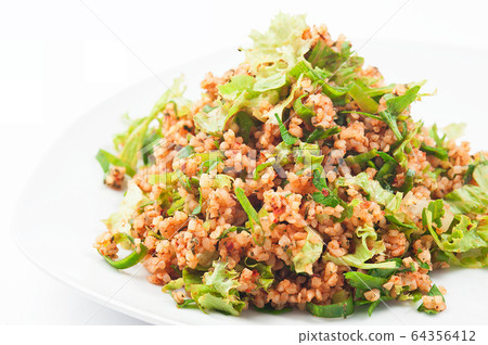 Turkish Bulgur kisir Salad. Bulgur salad with herbs. Turkish traditional cuisine. Turkish Bulgur kisir Salad. Bulgur salad with herbs. Turkish traditional cuisine. 64356412