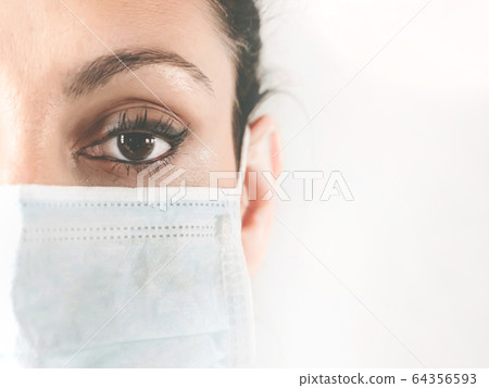 Female doctor in the protective mask 64356593