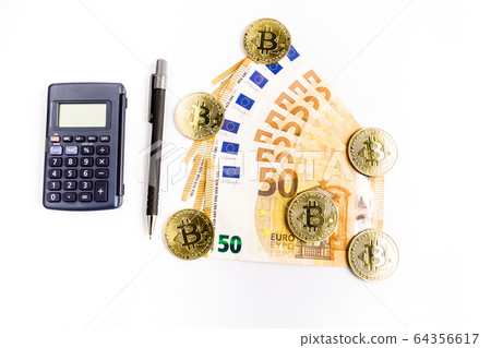 several bitcoin gold coins next to some euro 64356617