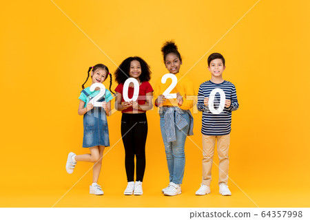 Cute mixed race kids smiling and holding 2020 numbers 64357998