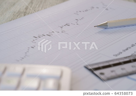 Stock chart, calculator, pen and ruler Stock chart, calculator, pen and ruler 64358073