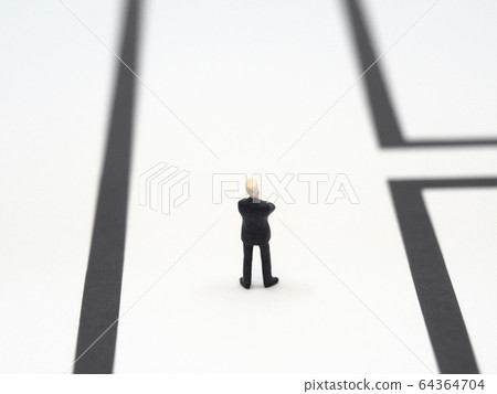 Temptation. Businessman worried before the side road of life 64364704