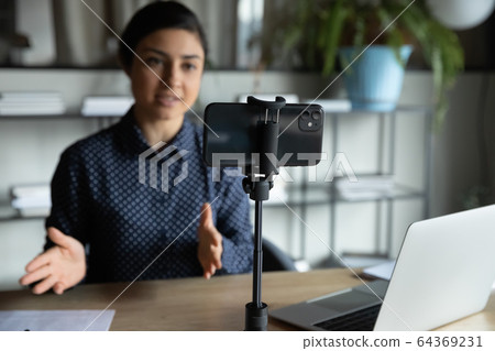 Modern smartphone shoot woman talking for live broadcast 64369231