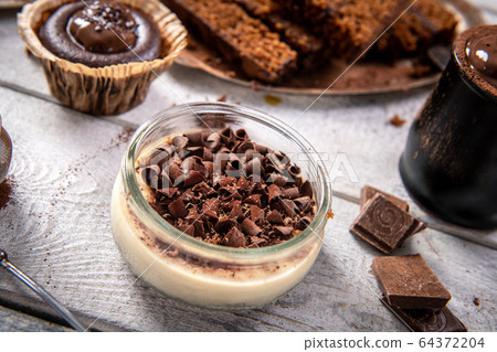 Delicious milk chocolate dessert with creamy 64372204