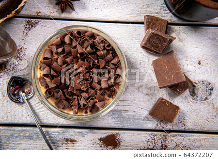 Delicious milk chocolate dessert with creamy 64372207