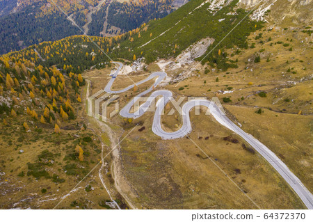 Drone aerial view - windy road in autumn Drone aerial view - windy road in autumn 64372370