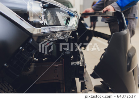 auto mechanic repair car body bumper replacement. auto mechanic repair car body bumper replacement. 64372537