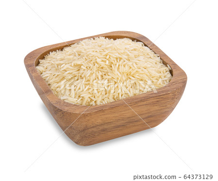 rice in wooden bowl isolated on white background 64373129