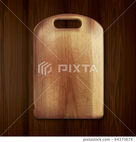 Wooden cutting board on a wooden table. Wooden cutting board on a wooden table. 64373674