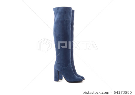 Female Legs in Classic Black and White Sneakers. Legs are Raised Upwards and Dangle from Side to Side. Grey Background. Classic Shoes. Healthy Lifestyle Female Legs in Classic Black and White Sneakers. Legs are Raised Upwards and Dangle from Side to Side. Grey Background. Classic Shoes. Healthy Lifestyle 64373890