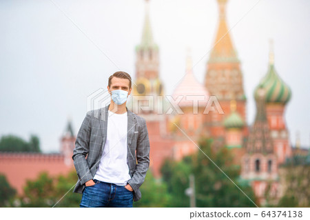 Happy young urban man in european city. Happy young urban man in european city. 64374138