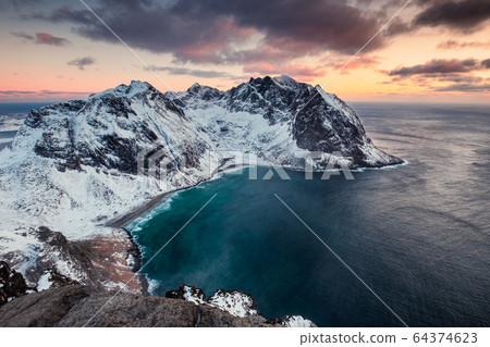 Scenery of Ryten mountain with Kvalvika beach on 64374623