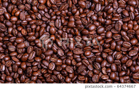Roasted coffee beans. Close-up. Coffee background. Roasted coffee beans. Close-up. Coffee background. 64374667