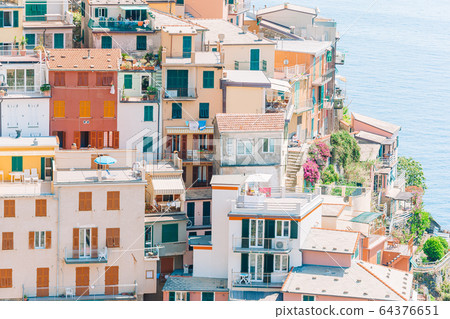 Amazing view of the beautiful village of Manarola in the Cinque Terre Reserve. Amazing view of the beautiful village of Manarola in the Cinque Terre Reserve. 64376651