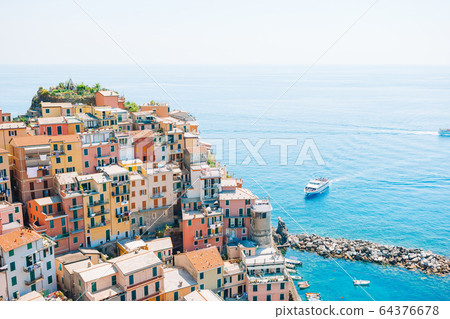 Amazing view of the beautiful village of Manarola in the Cinque Terre Reserve. Amazing view of the beautiful village of Manarola in the Cinque Terre Reserve. 64376678