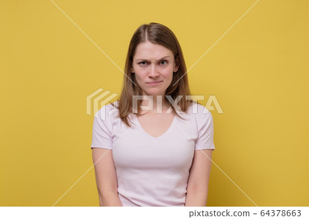 beautiful young caucasian girl is angry with her beautiful young caucasian girl is angry with her 64378663