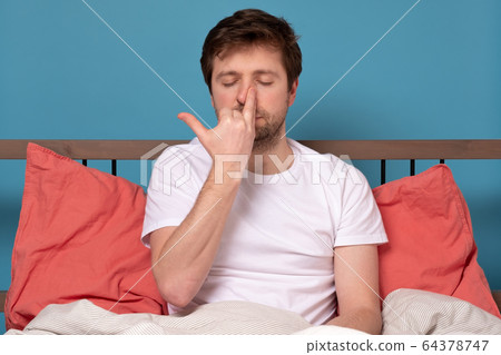 man breathing Alternate Nostril Breathing 64378747
