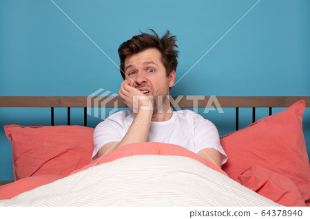 man in is exhausted with insomnia or illness being man in is exhausted with insomnia or illness being 64378940