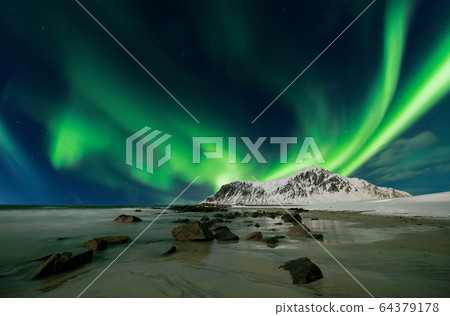 Aurora borealis also called northern lights over 64379178