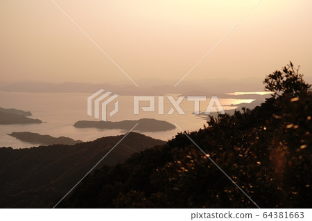 Amakusa islands floating at sunset seen from the summit of Ryugatake 64381663