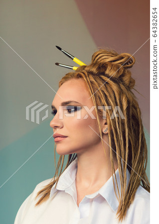 Portrait high fashion model false dreadlocks Portrait high fashion model false dreadlocks 64382654