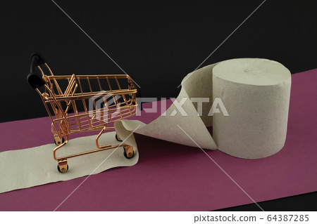 Toilet paper or paper towel and shopping cart Toilet paper or paper towel and shopping cart 64387285