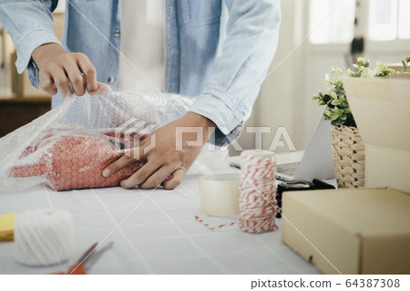 Online small business owner. 64387308