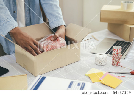 Online small business owner. 64387309