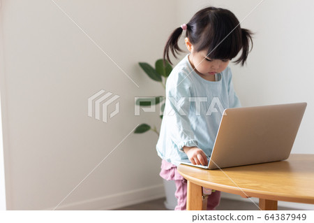 Children watching videos 64387949