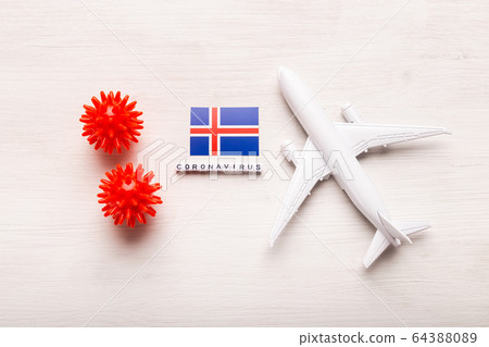 Flight ban and closed borders for tourists and travelers with coronavirus covid-19. Airplane and flag of Iceland on a white background. Coronavirus pandemic. Flight ban and closed borders for tourists and travelers with coronavirus covid-19. Airplane and flag of Iceland on a white background. Coronavirus pandemic. 64388089