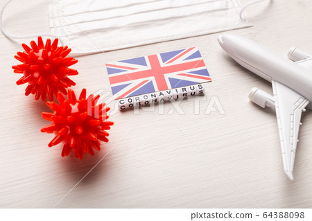 Flight ban and closed borders for tourists and travelers with coronavirus covid-19. Airplane and flag of United Kingdom on a white background. Coronavirus pandemic. 64388098