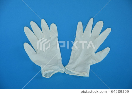 白色橡膠手套背景藍色 白色橡膠手套背景藍色 64389309