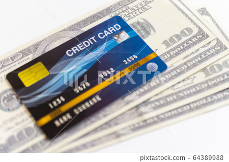 Credit cards and 100 dollars in cash 64389988
