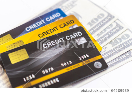 Credit cards and 100 dollars in cash 64389989