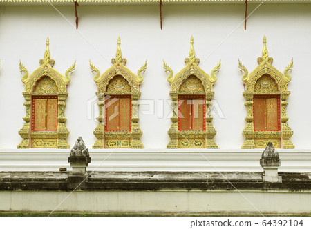 Traditional Thai style window temple Traditional Thai style window temple 64392104