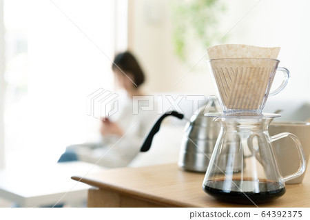 Female smartphone housewife 64392375