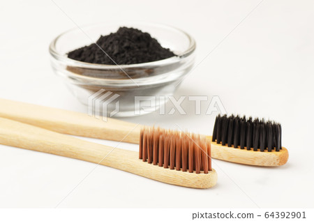 Bamboo toothbrush with black charcoal toothpaste 64392901