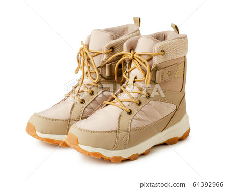 Girl's brown winter fashion boots isolated 64392966